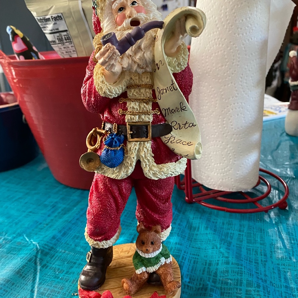 One very heavy cute Santa.